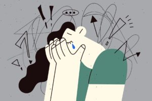 Ilustracja przedstawiająca płaczącą kobietę, która cierpi na depresję lub zaburzenia lękowe